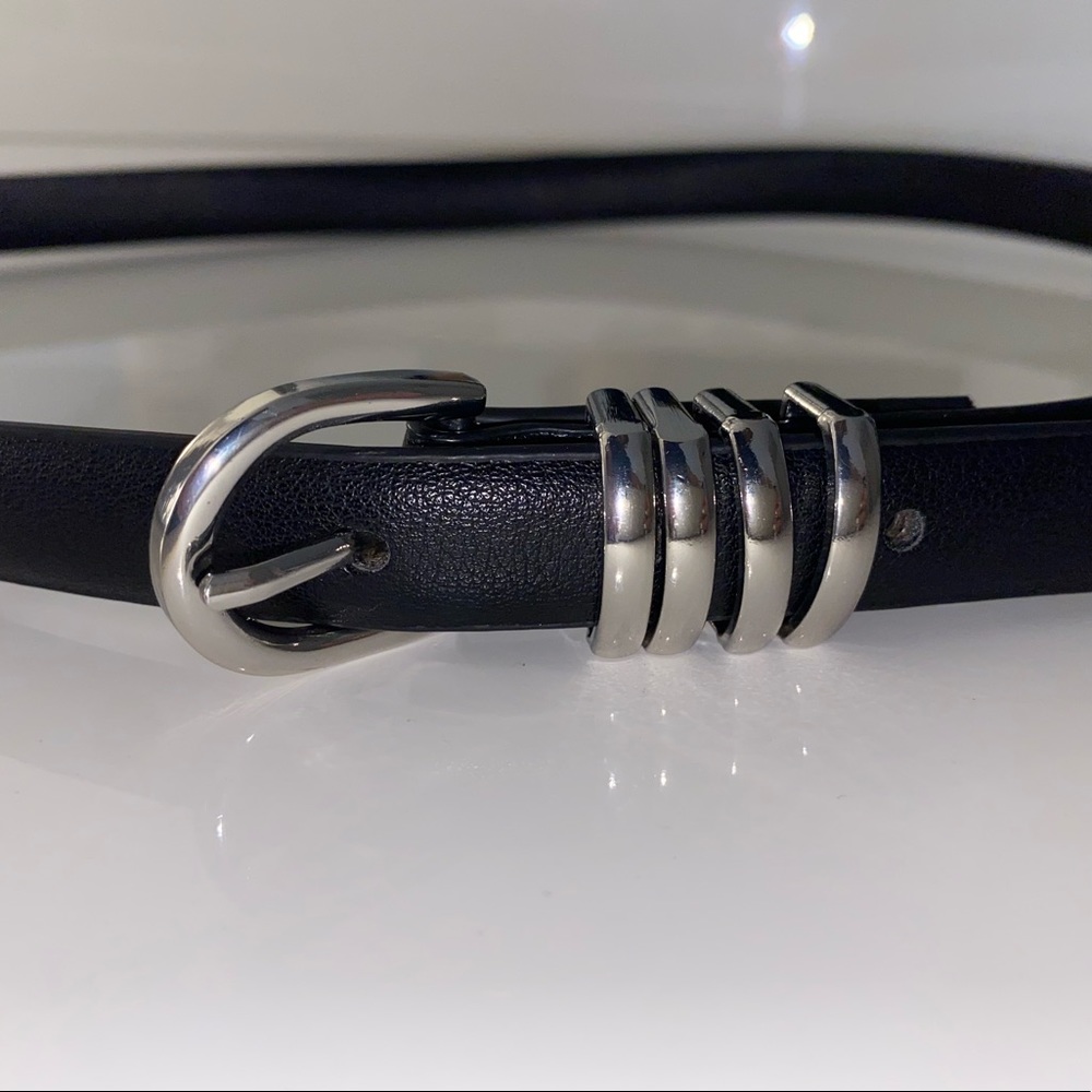 Thin black belt with silver detailing